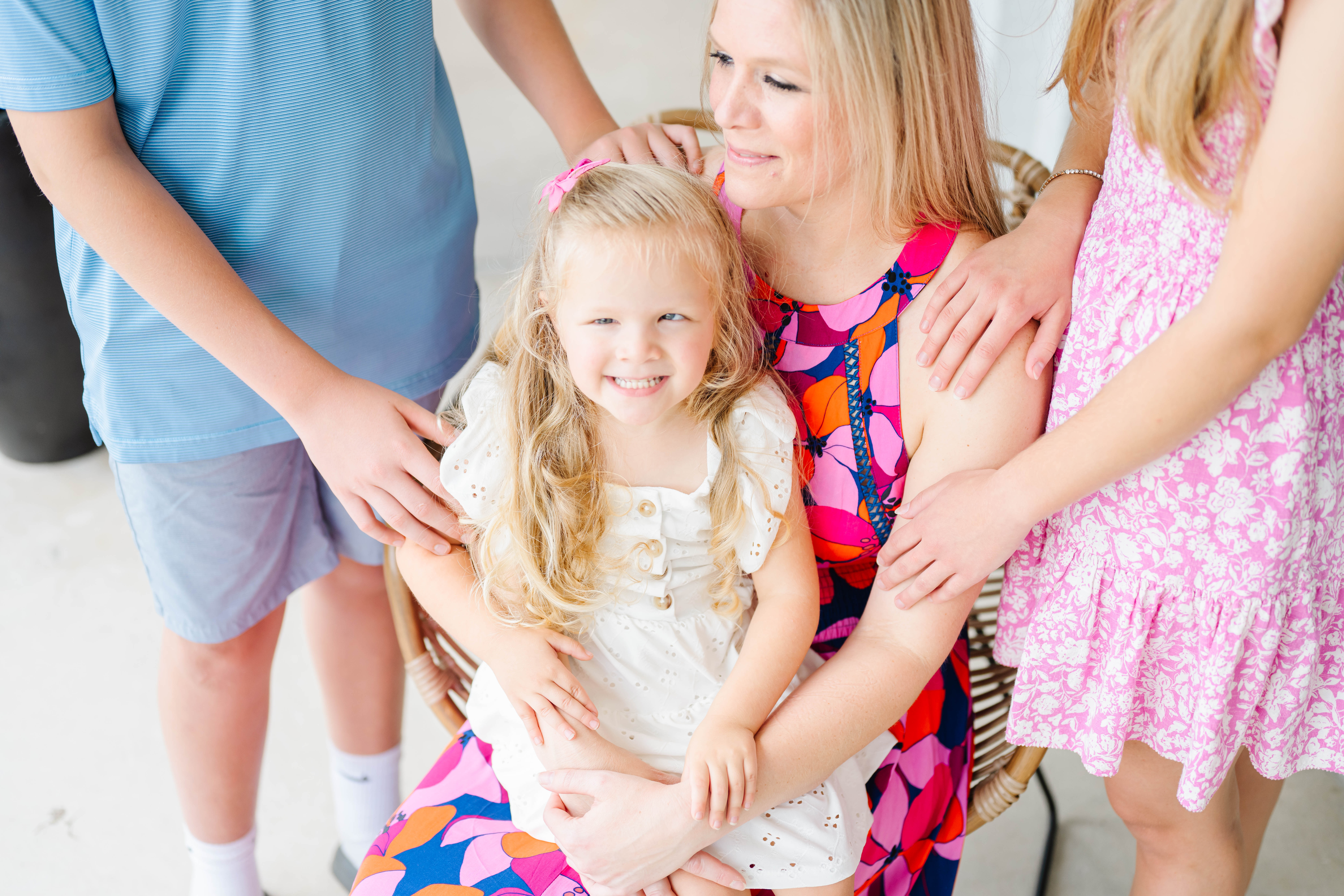 Mother and son sitting outdoors